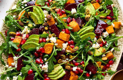 Roasted Sweet Potato and Beet Noodle Salad with Goat Cheese and Pistachio Vinaigrette